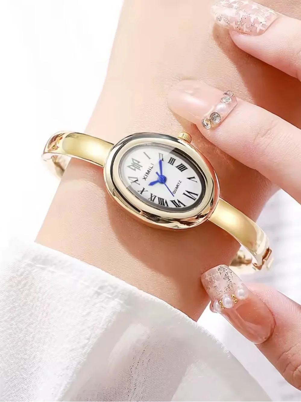 Elegant Gold-Tone Stainless Steel Bangle Watch